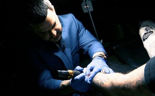 ‘A rule worth breaking’ RI tattoo artist turns dream behind bars into reality