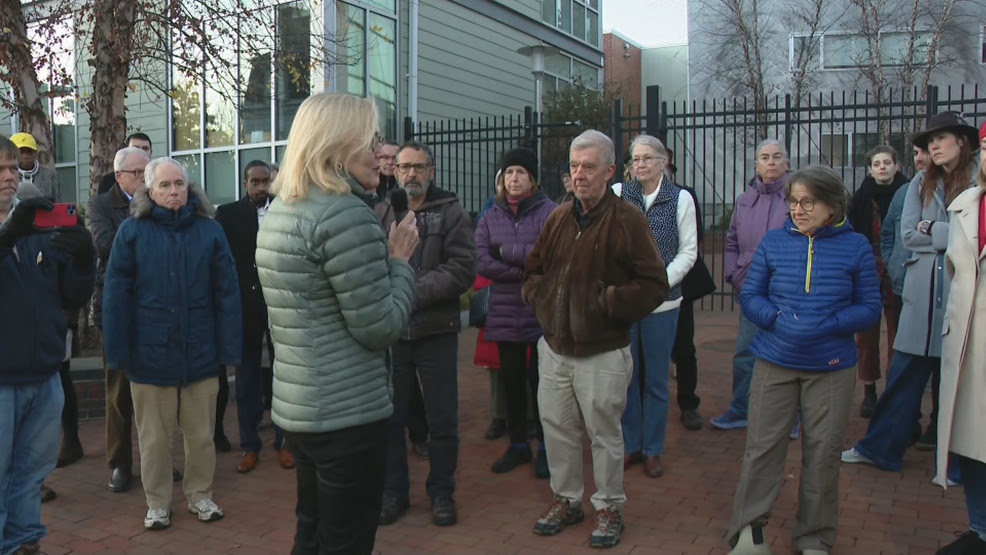 Neighbors hold vigil to save three Angell Street homes in Providence