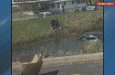 SUV plunges into Cranston retention pond during police pursui